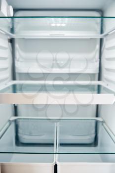 View Looking Inside Empty Refrigerator With Closed Door