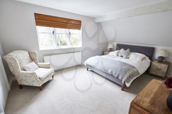 Interior View Of Beautiful Bedroom With Soft Furnishings In Family House