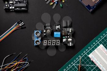 Overhead Flat Lay Shot Of Electronic Computer Components On Black Background