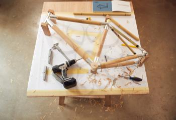 Hand Built Sustainable Bamboo Bicycle Frame Being Assembled In Workshop