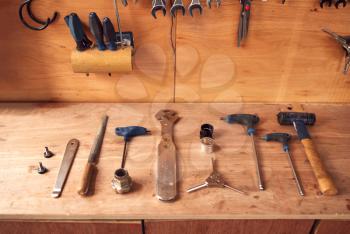 Close Up Of Carpentry Tools On Workbench In Workshop