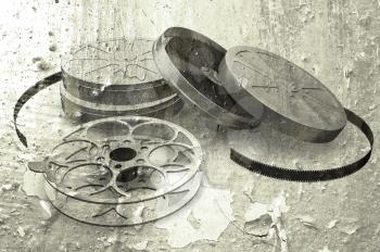 Royalty Free Clipart Image of a Movie Reel on a Grungy Background