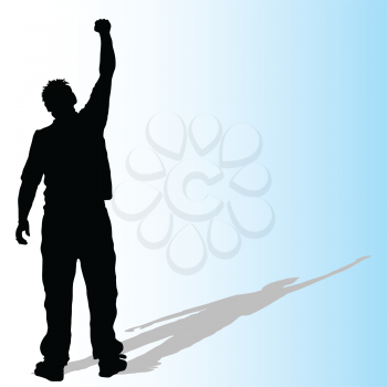 Silhouette of a man punching the air