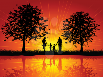 Silhouette of a family walking outside under trees