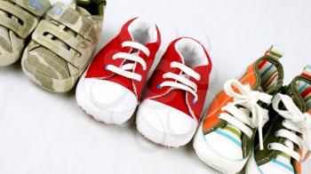 Line up of baby shoes