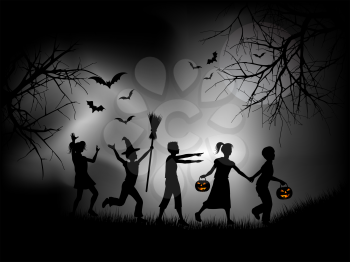 Children playing on Halloween night