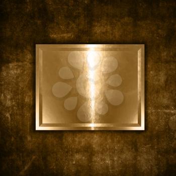 Gold metal plate on a grunge background