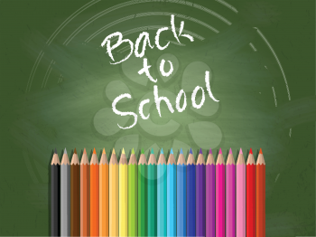 Back to school background with chalkboard and coloured pencils