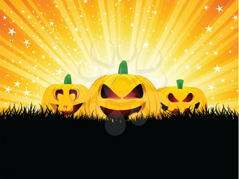 Halloween background with pumpkins in grass