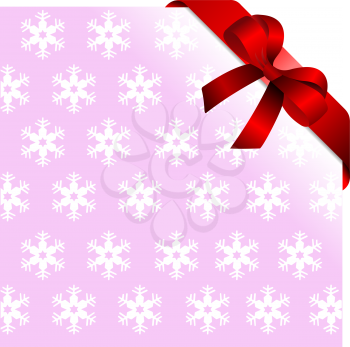 Snowflakes pink background with red ribbon and bow. Place for copy/text. 