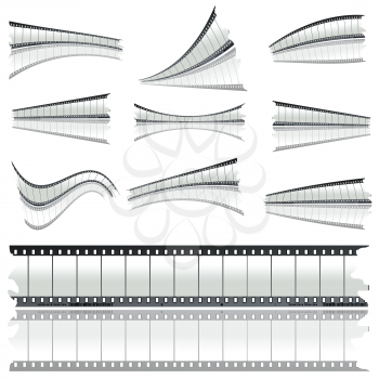 Twisted negative film strips against white background