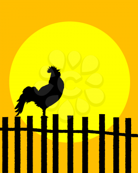 Rooster silhouette on a fence announcing sunrise