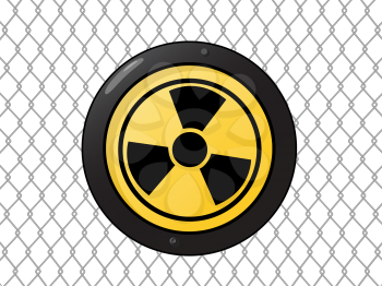 Metallic nuclear sign against a wire fence