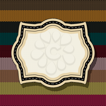 Royalty Free Clipart Image of a Vintage Label on a Striped Knitted Background