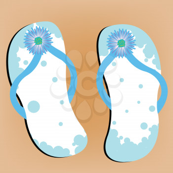Royalty Free Clipart Image of Flip Flops on a Sandy Beach