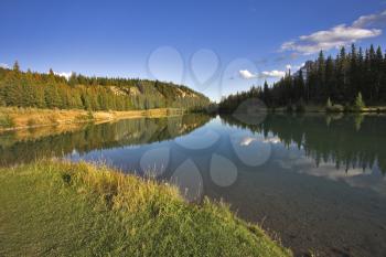 Royalty Free Photo of a Shallow Lake Near Mountains