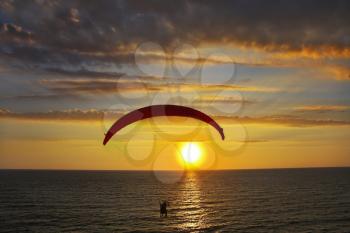 Royalty Free Photo of a Person Parachuting 