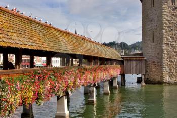 Royalty Free Photo of a Bridge in Lake Lucerne