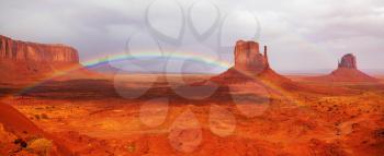 Royalty Free Photo of a Rainbow in Monuments Valley  in Navajo
