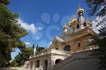 Church of Mary Magdalene in Jerusalem. Golden domes and creamy Jerusalem stone walls
