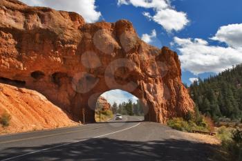 A red canyon and road in state of Utah in the USA