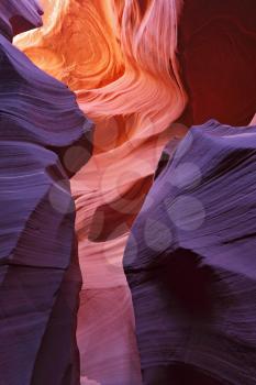 Glowing colorful underground corridor. Famous slot Antelope canyon  in the Navajo reservation. USA.
