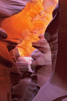 Glowing colorful underground footpath. Famous slot Antelope canyon  in the Navajo reservation. USA.