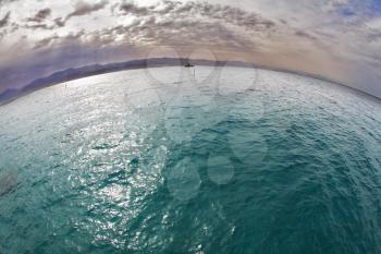 Early spring on a beach of Red sea in Israel.  It is photographed by an objective the Fish eye