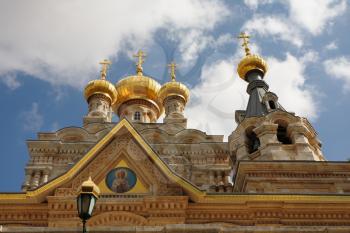 Church of Mary Magdalene in Jerusalem. Golden domes and white stone cladding
