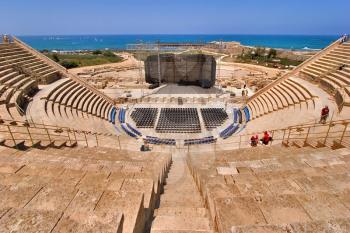  An amphitheater of the period of the Roman invasion in national park Caesarea  on Mediterranean sea