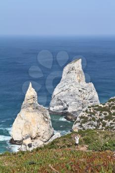 Picturesque rocks, similar to ice cream. Coast of Portugal, Cape Cabo da Roca - the westernmost point of Europe. Morning sunrise