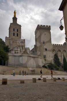 
Square in front of a pope's palace in Avignon and children playing ball

