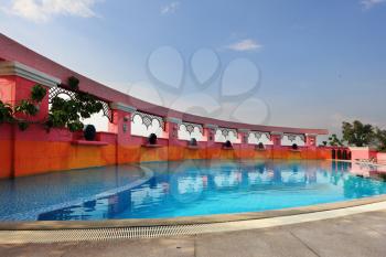 The elegant swimming pool at the twentieth floor of a luxury hotel in Bangkok.
 Sunset
