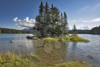 Lake and small picturesque island in reserve in the north of Canada