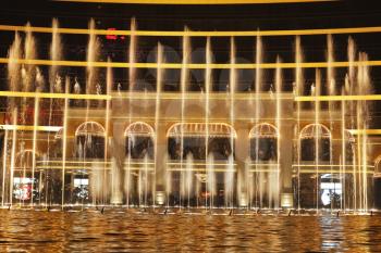 Magnificent evening performance  Dancing fountains  in the entertaining center of island Ma?au