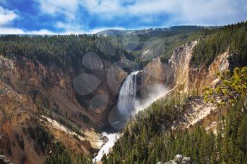 Autumn to Yellowstone national park. The well-known mountain falls, the river and forest