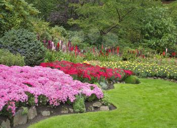 Charming multi-colour flower bed  in well-known Butchard-garden in Canada