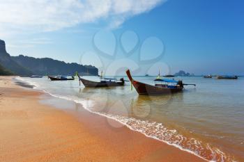 Beach, boats, sea, sky ... Island in the  Thai Gulf, the tourist season