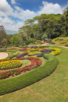 The most beautiful park in Southeast Asia. Magnificent flower beds, green lawns and tropical trees