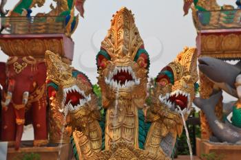 The famous Golden Triangle. Place on the Mekong River, which borders three countries - Thailand, Myanmar and Laos. Dragons, elephants and fish. Fountain