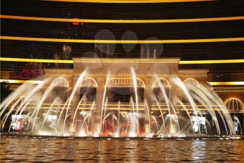 Magnificent evening performance  Dancing fountains  in the entertaining center of island Ma?au