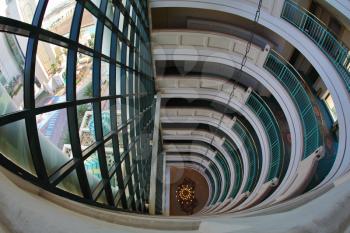 Interiors of floors, huge window and luster in multi-storey hotel