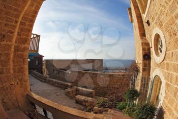 The ancient small city Jaffo on the bank of Mediterranean sea, in  lens Fish eye