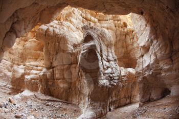The picturesque narrow slot canyon in the mountains of the ancient Dead Sea