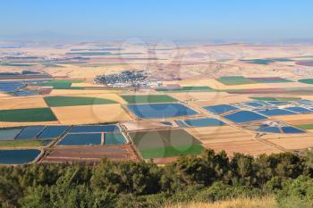  Photo from Mount Barkan. Picturesque squares colored fields of the valley of Galilee