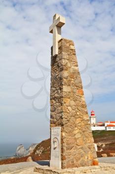 The obelisk with a large white cross. Cabo da Roca - the extreme western point of Europe