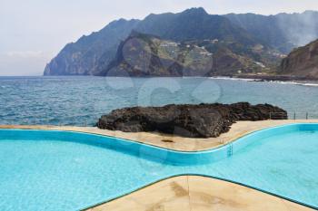 Picturesque, the freakish form swimming pool at coast of Atlantic ocean on island Madiera
