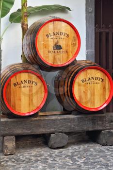 MADEIRA  ISLAND, PORTUGAL - OCTOBER 8: Classic huge oak barrels of wine  Madera. Storage of wine well-known firm