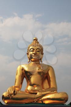The famous Golden Triangle. Place on the Mekong River, which borders three countries - Thailand, Myanmar and Laos. The huge Golden Buddha shines in the sun