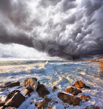 A terrible storm and lightning over the raging surf. Mediterranean Sea, Israel
